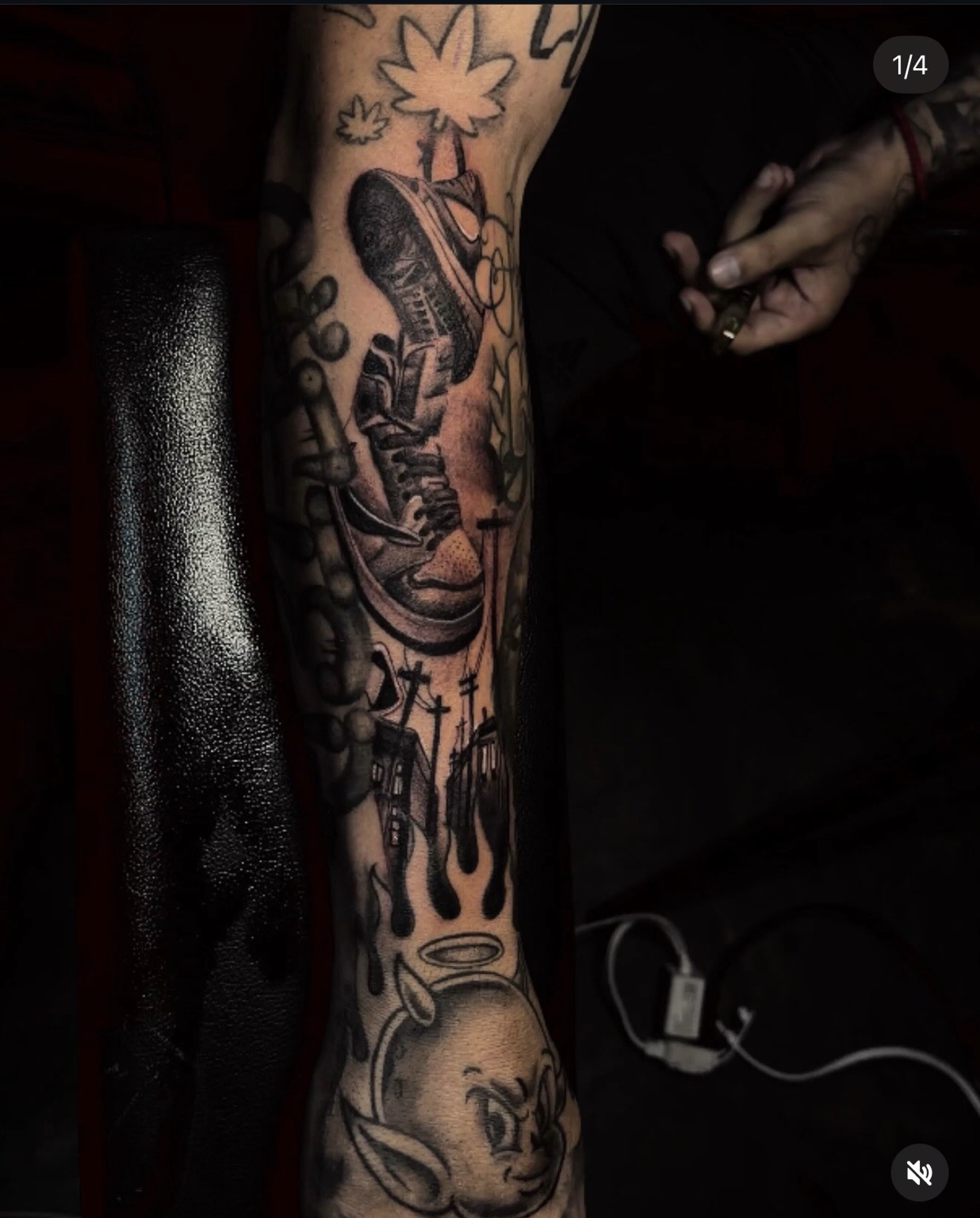 Large leg piece blending a sneaker, flames, and street-art inspired characters.